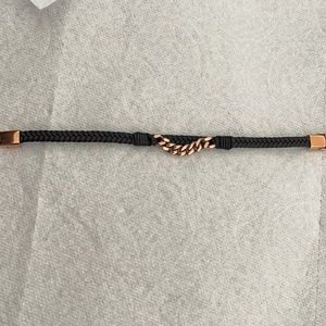 Men's gold and black bracelets